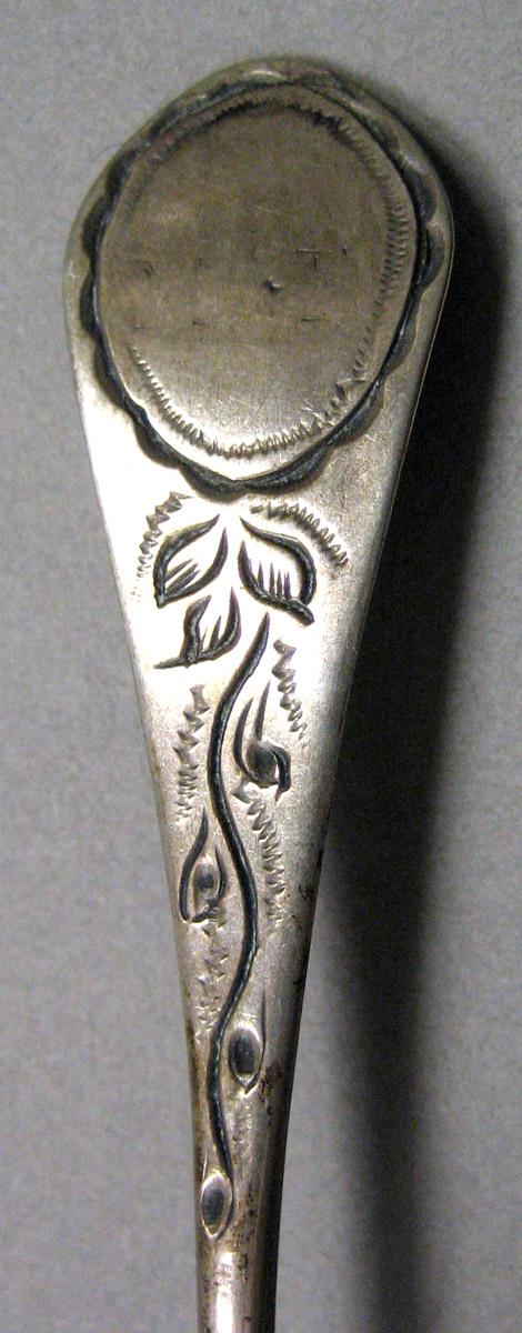 1962.0240.711 Silver Spoon engraving