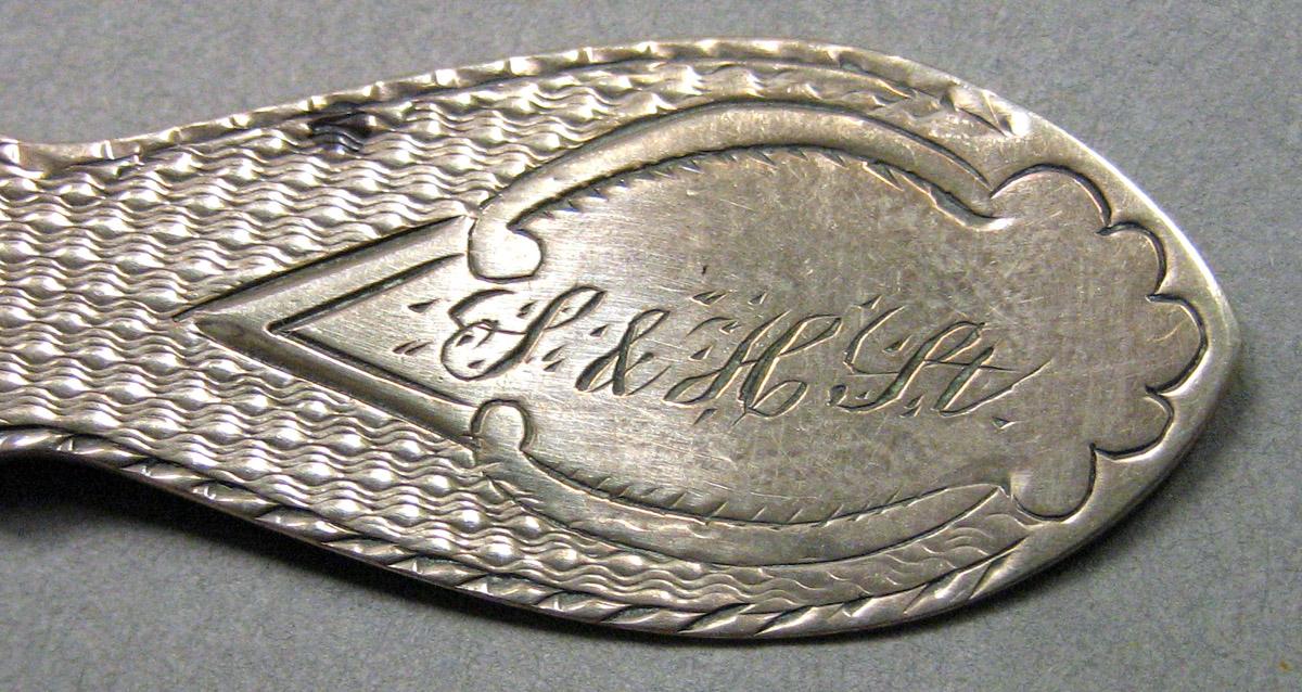 1962.0240.734.001 Silver Spoon engraving