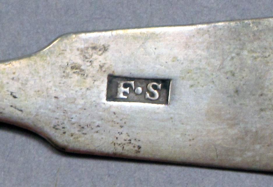 1962.0240.825 Salt spoon mark