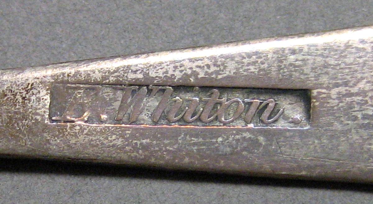 1962.0240.839 Miniature spoon mark