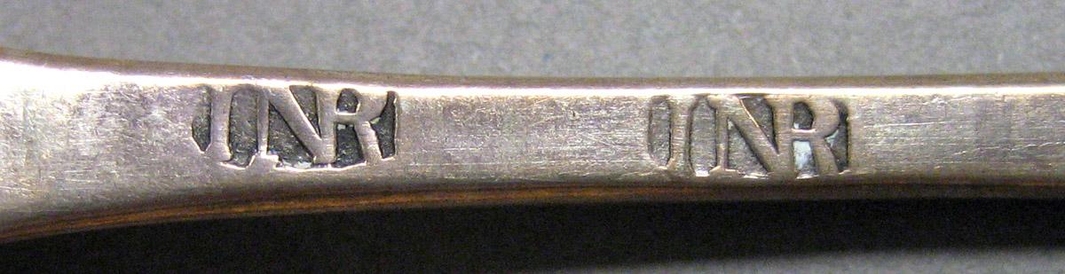 1962.0240.858 Teaspoon mark