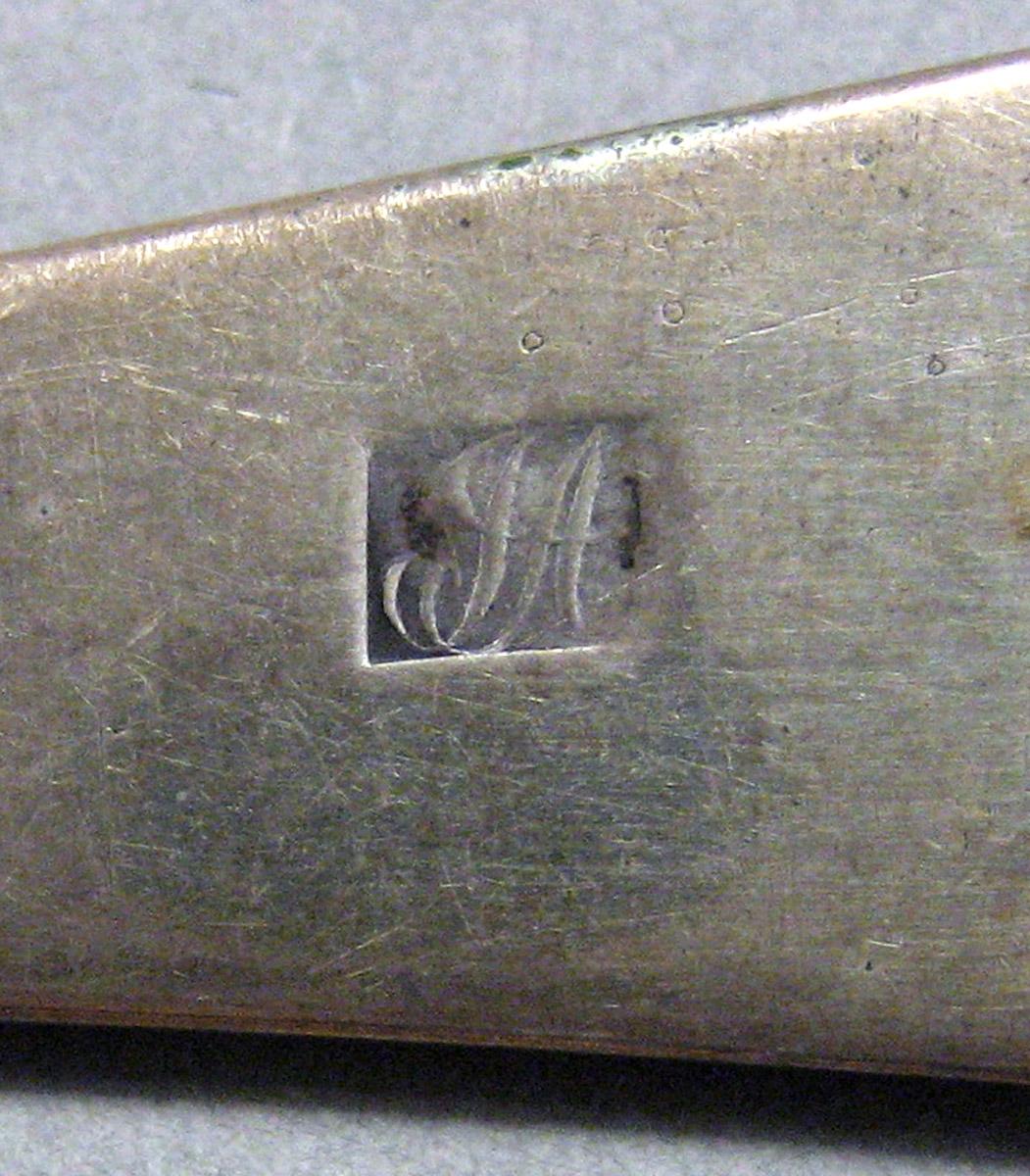 1962.0240.872 Tablespoon mark