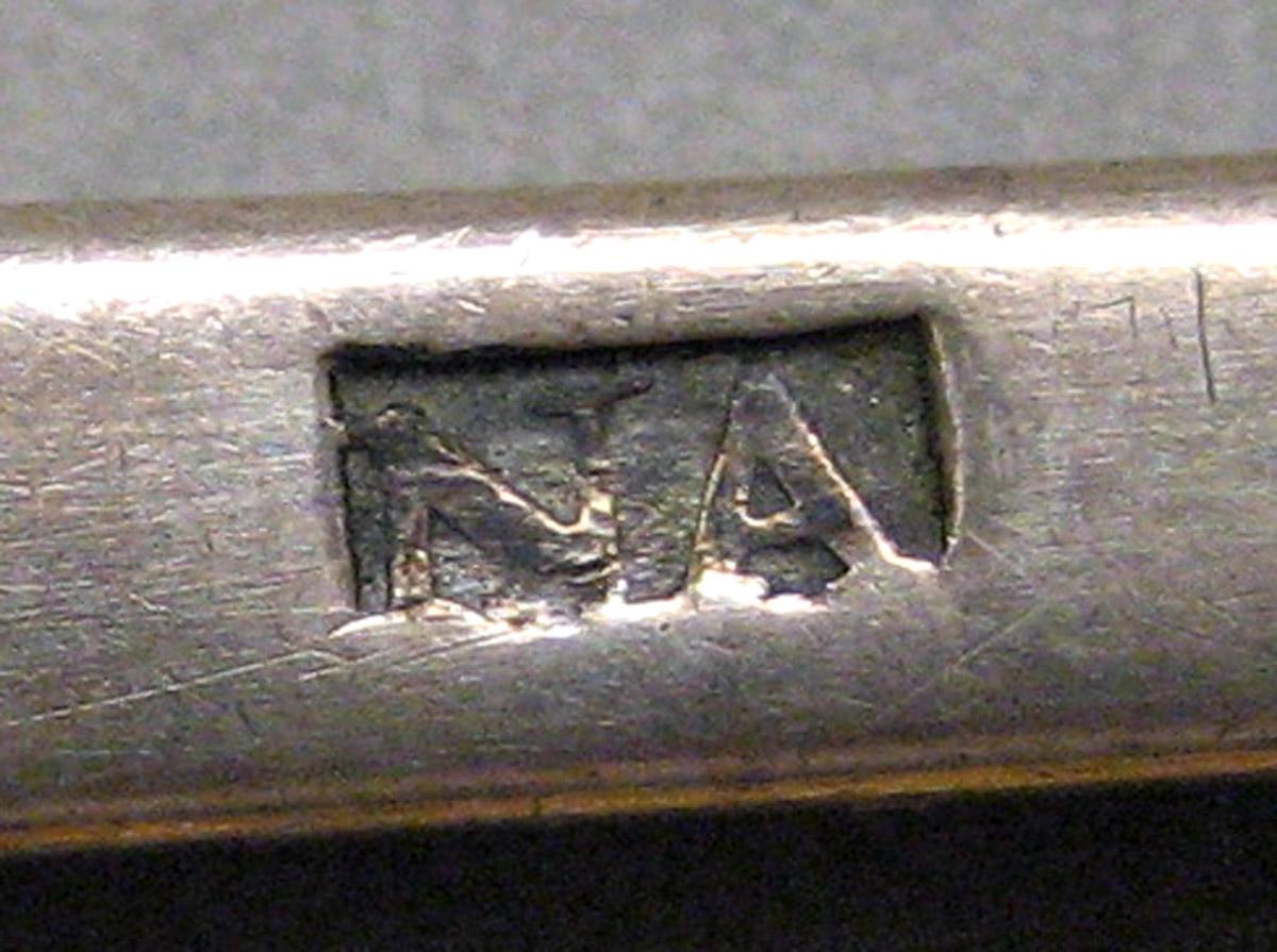 1962.0240.873 Tablespoon mark