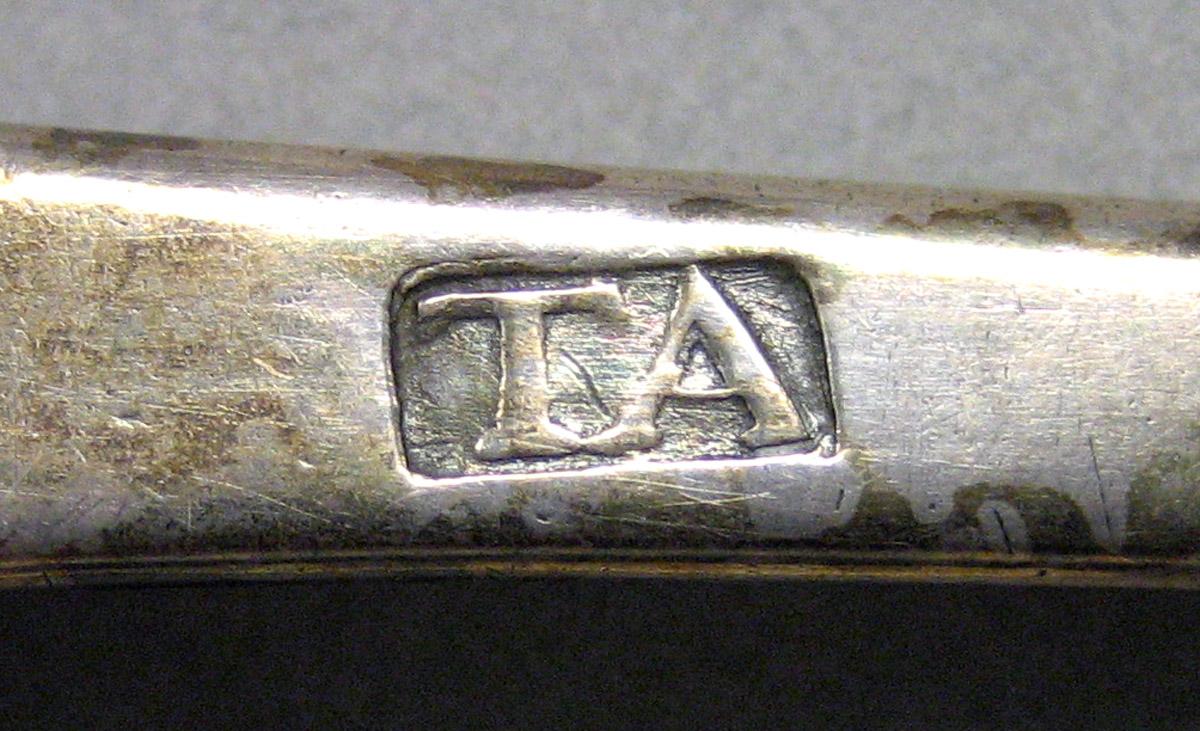 1962.0240.875 Tablespoon mark