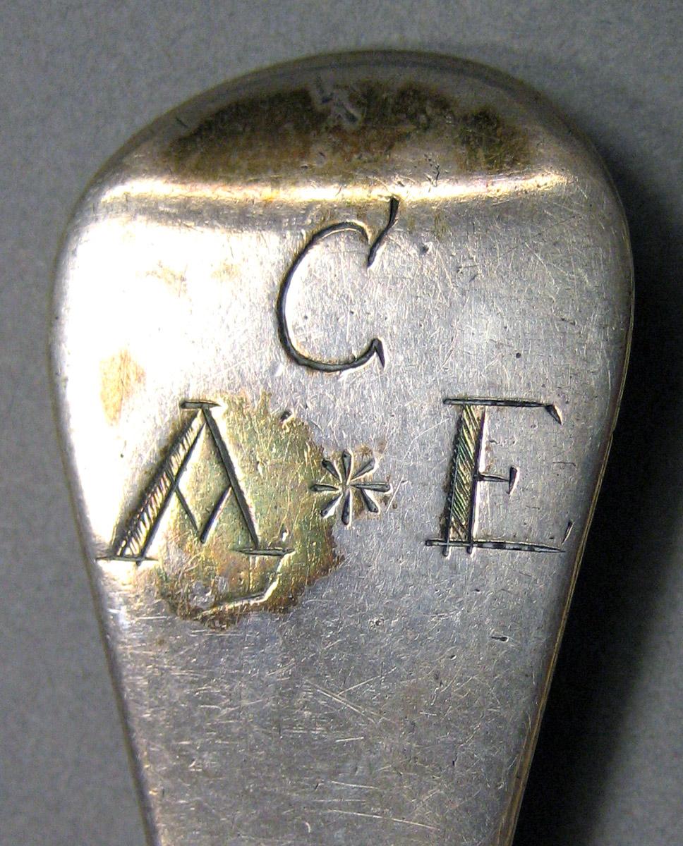 1962.0240.875 Tablespoon engraving