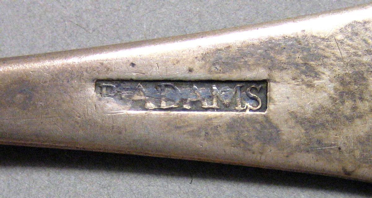 1962.0240.877 Tablespoon mark