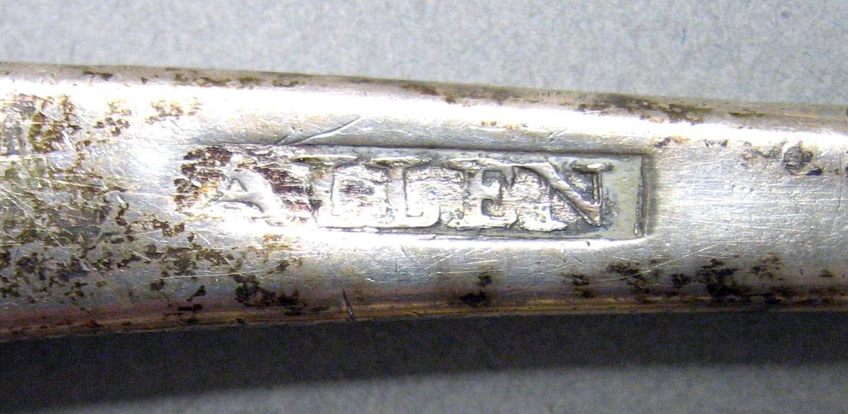1962.0240.883 Tablespoon mark