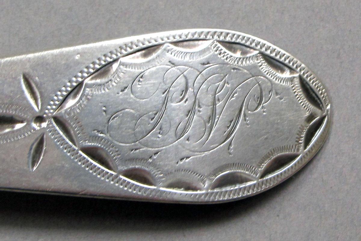 1962.0240.911 Silver Spoon engraving