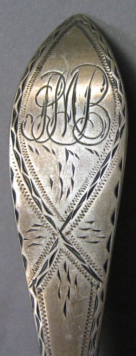 1962.0240.942 Silver Spoon engraving