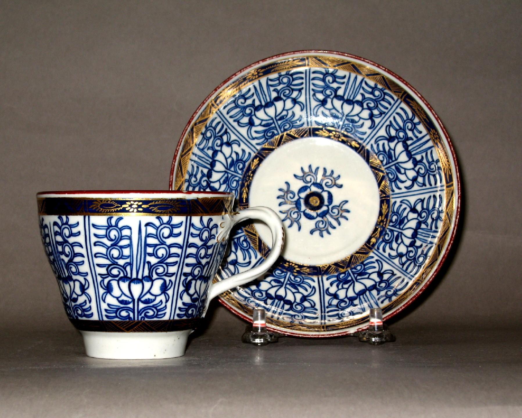 1962.0509 A, B Soft-paste porcelain "Royal Lily" patterned teacup and saucer