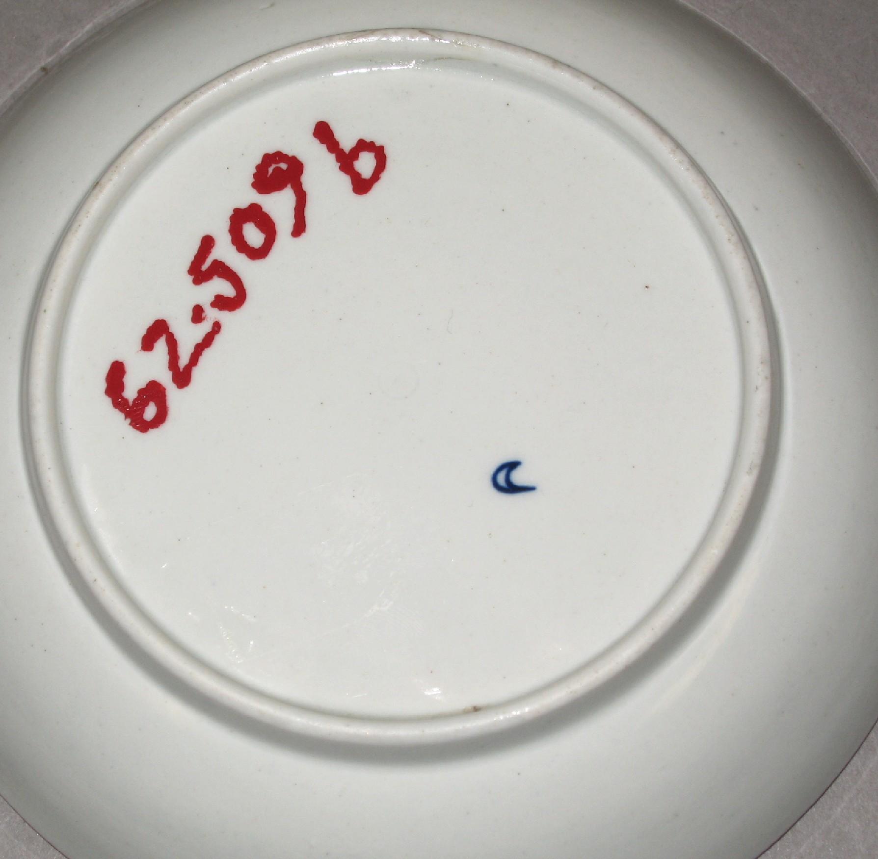 1962.0509 B Soft-paste porcelain "Royal Lily" patterned saucer (mark)