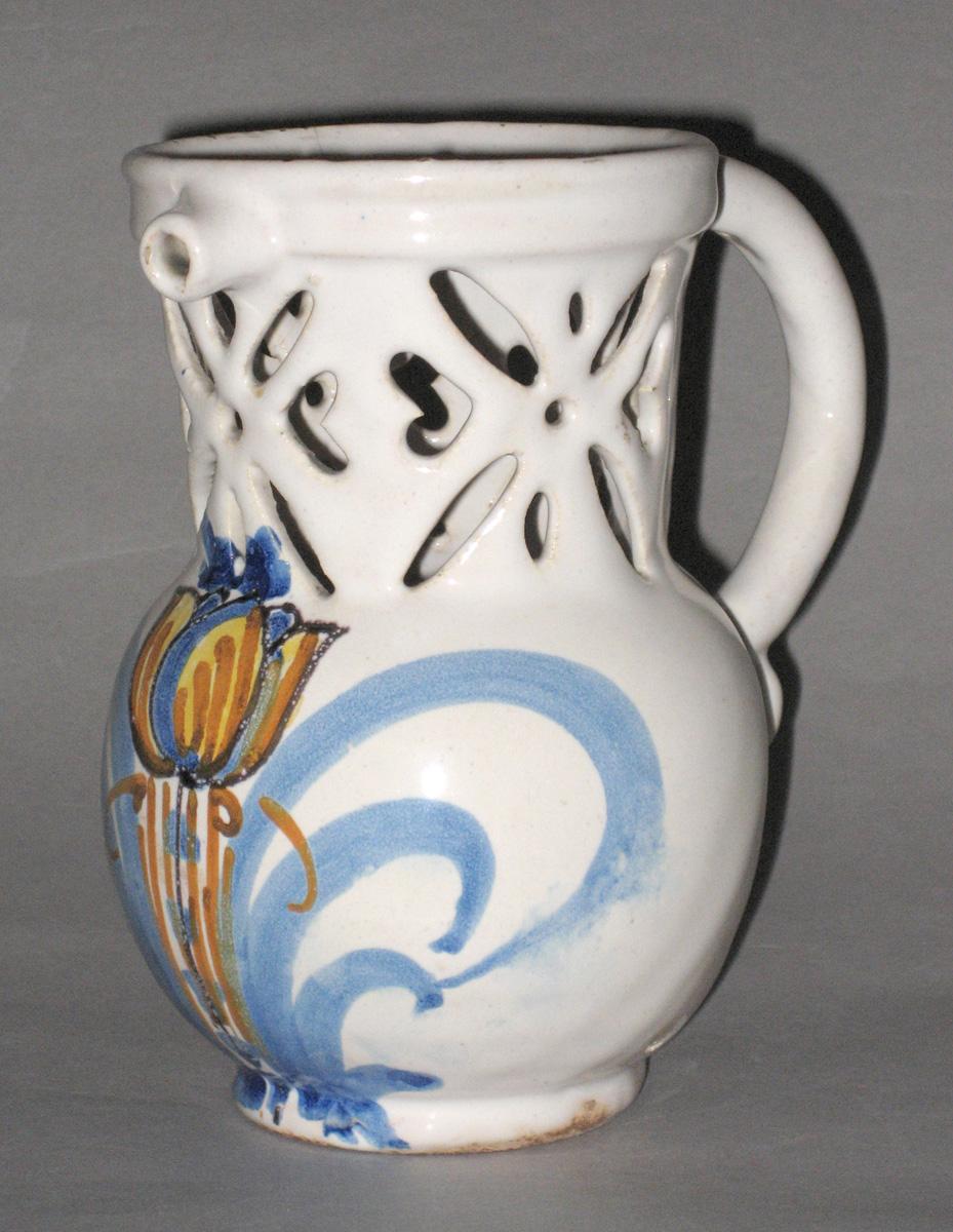 1962.0600 Delftware or faience puzzle jug
