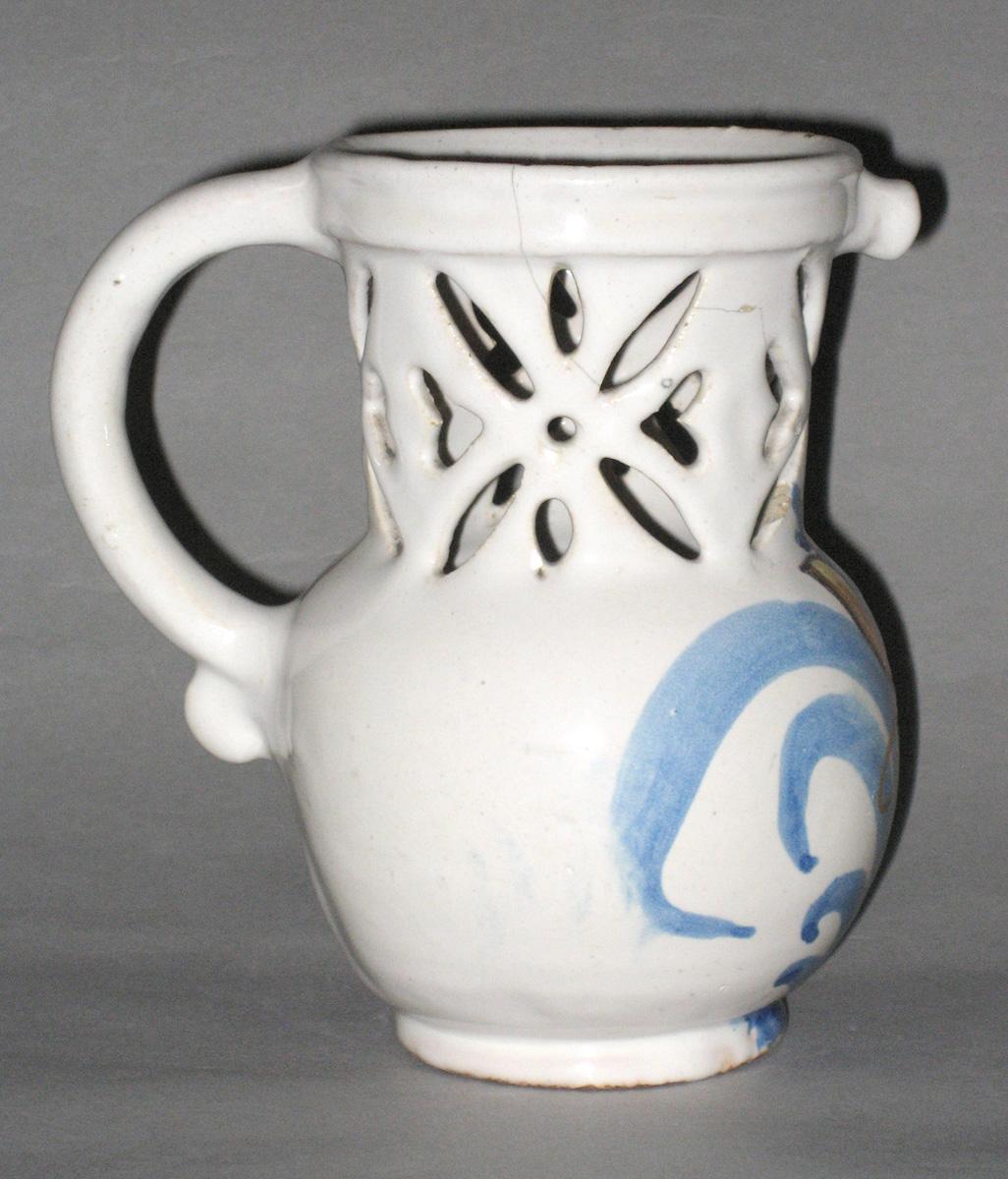 1962.0600 Delftware or faience puzzle jug (profile)