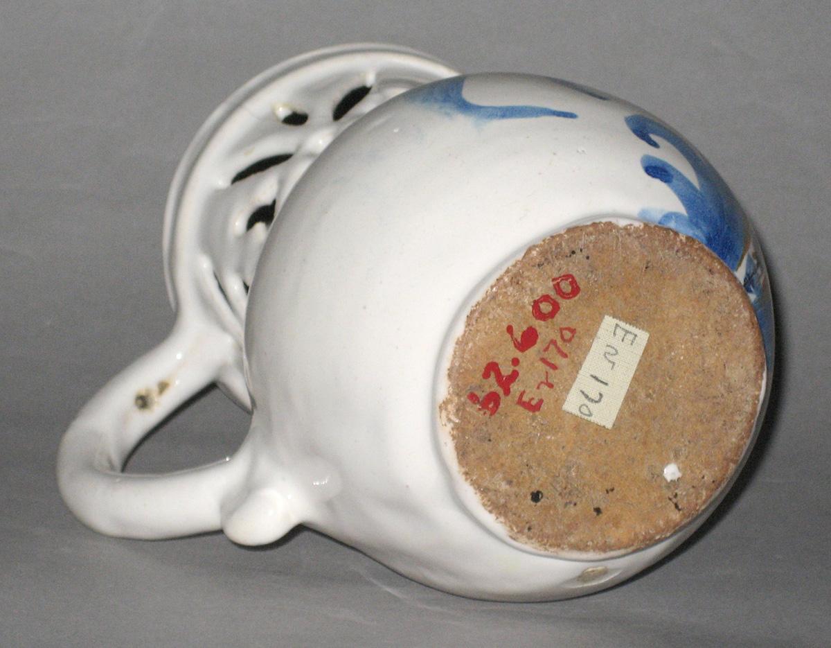 1962.0600 Delftware or faience puzzle jug (bottom)