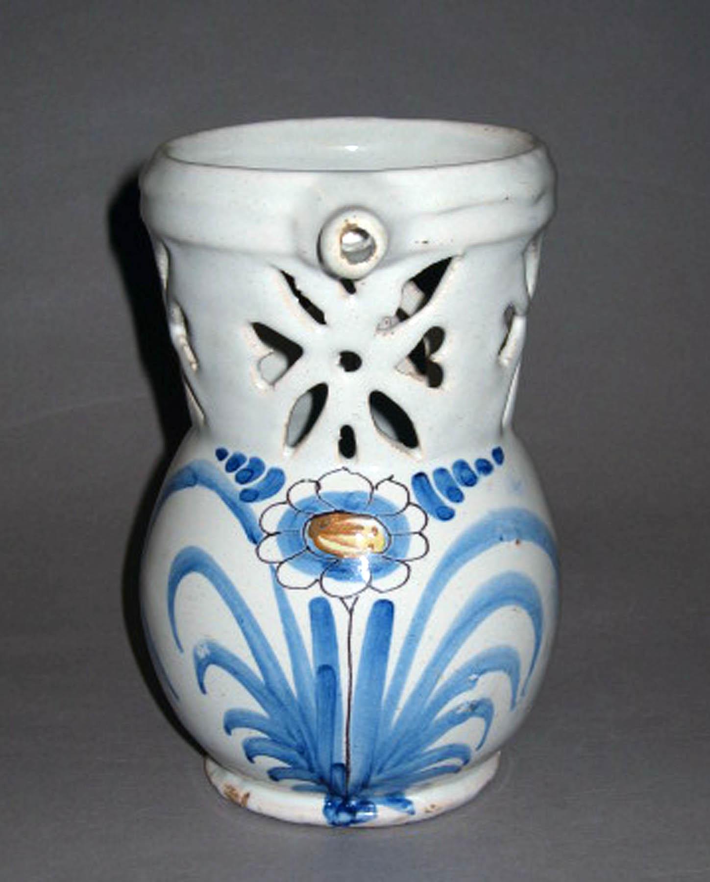 1962.0602 Tin-glazed earthenware puzzle jug