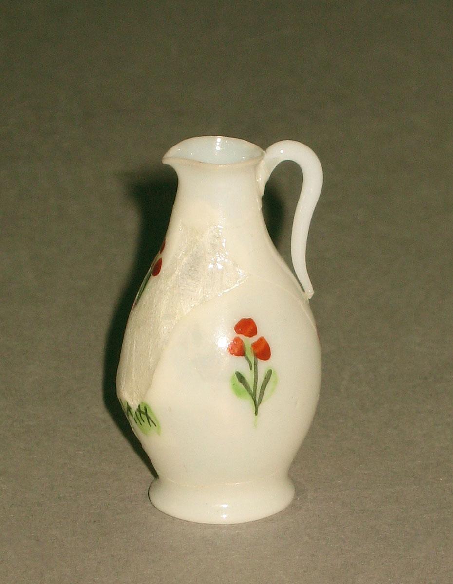 1962.0630 E Glass miniature jug