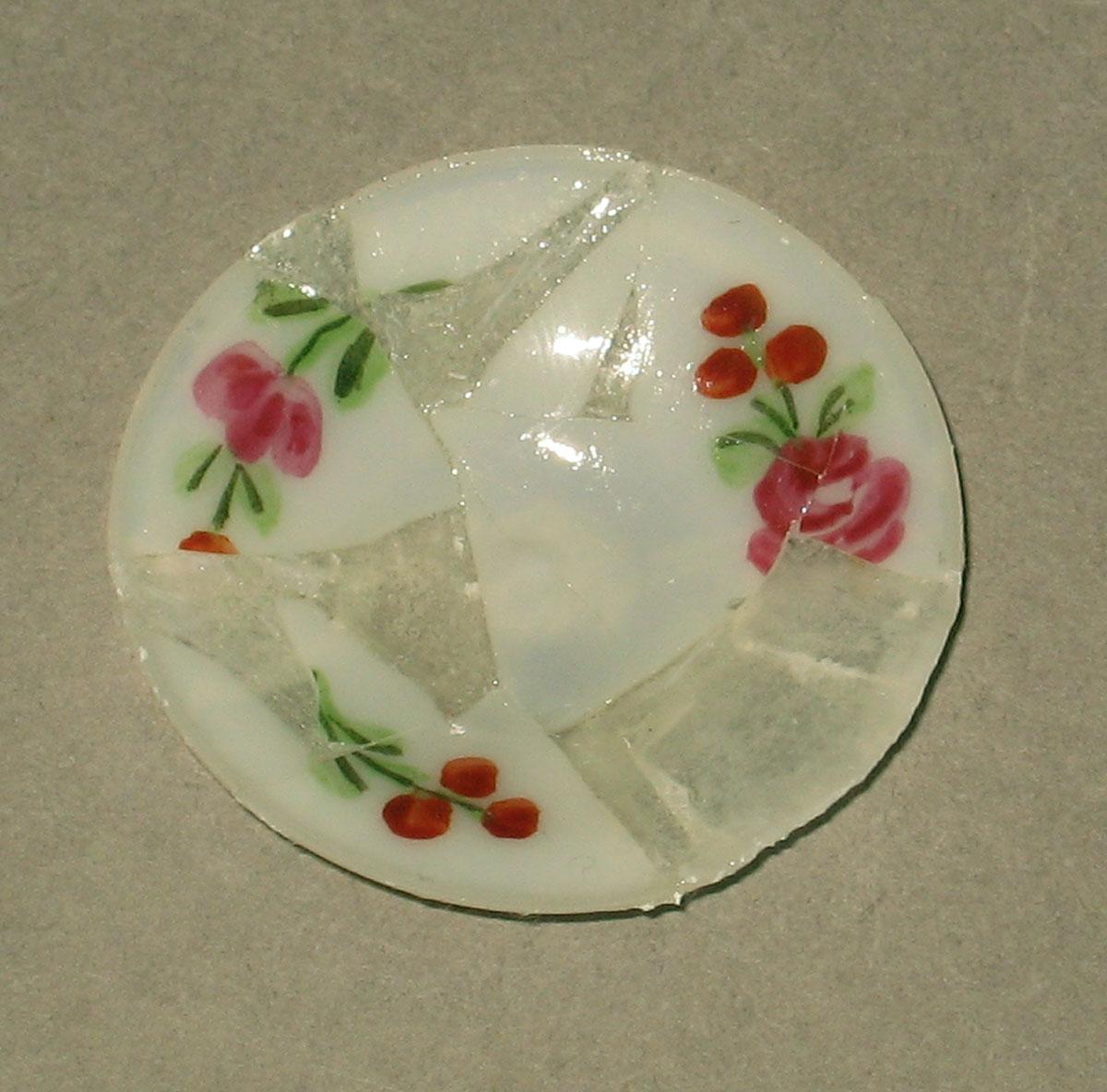1962.0630 H Glass miniature plate