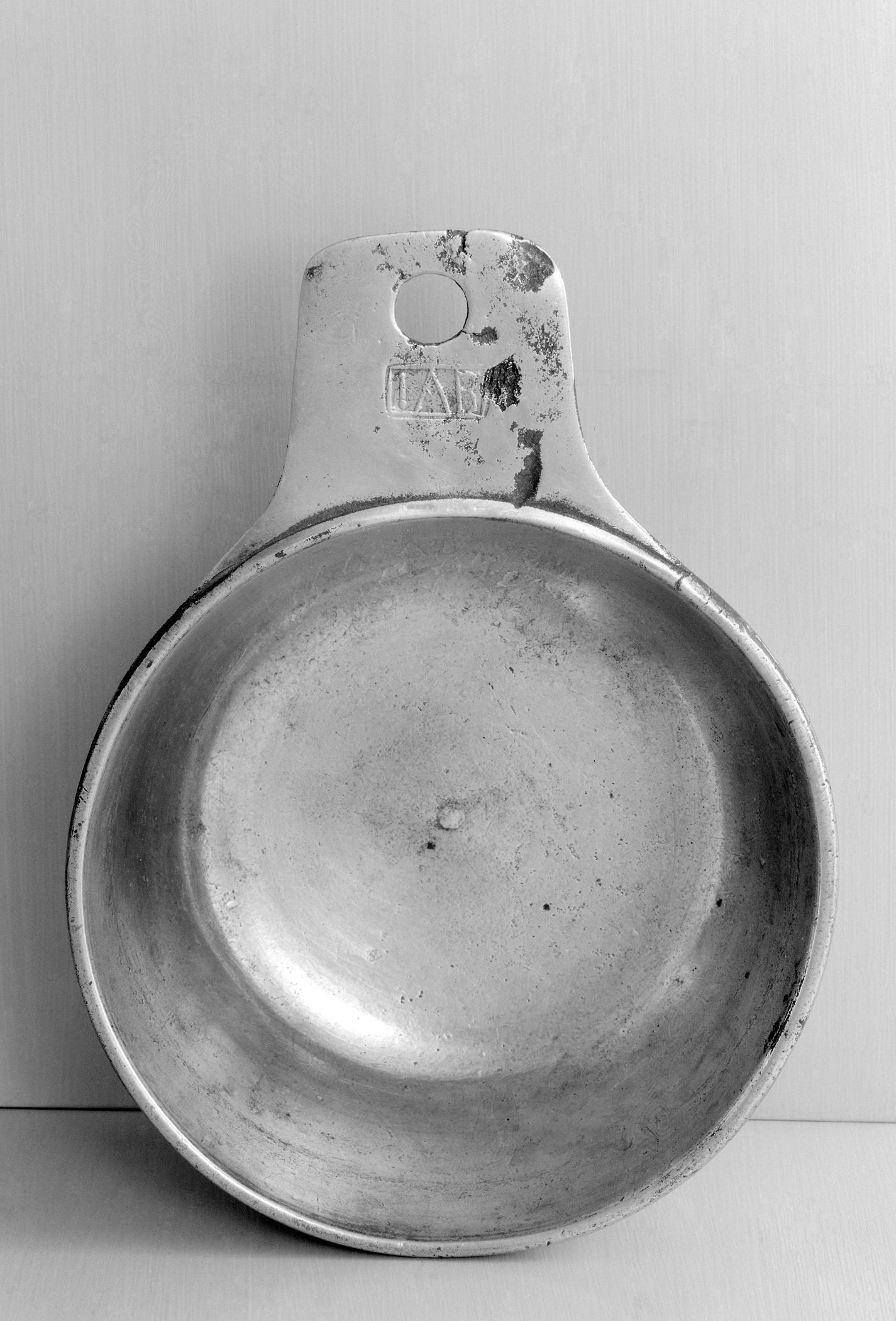 1962.0632 Pewter porringer