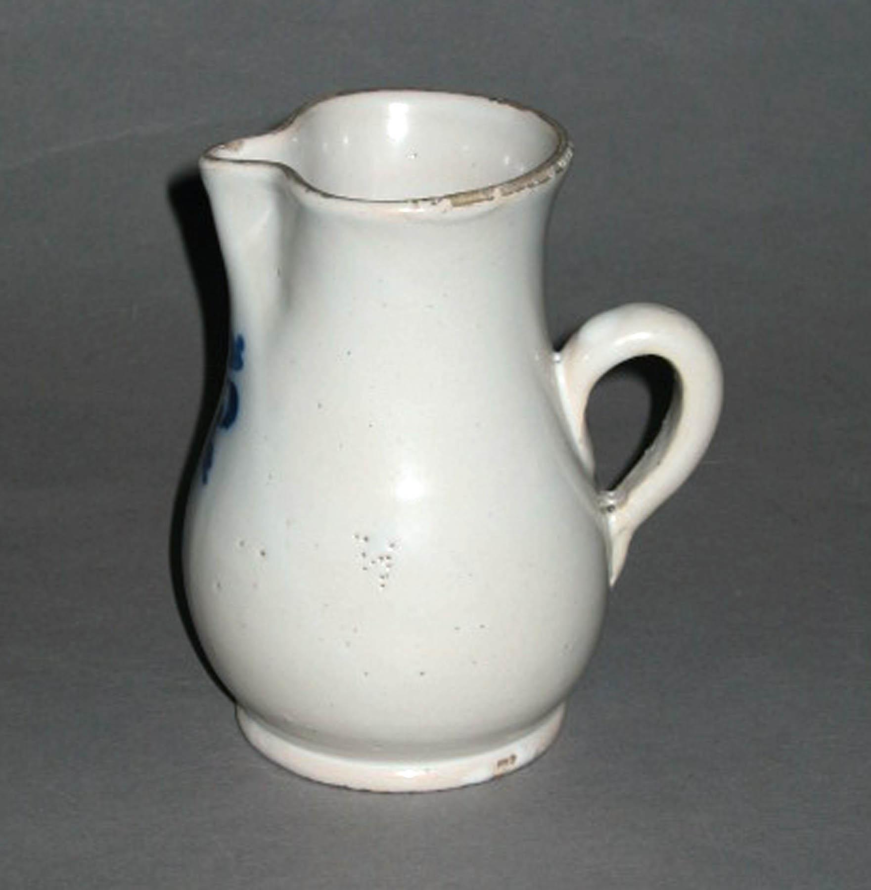 1962.0638 Faience jug (profile)