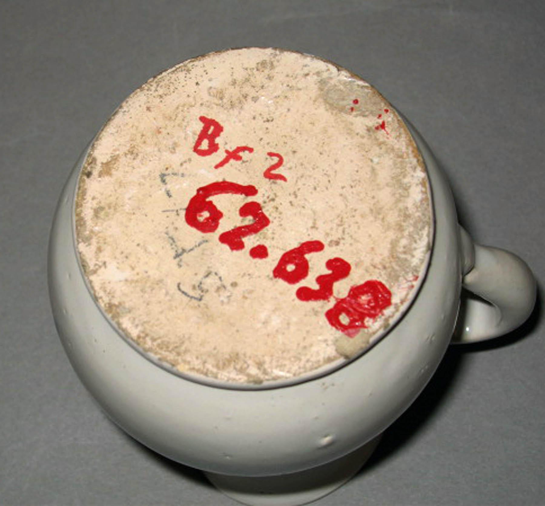 1962.0638 Faience jug (underside)