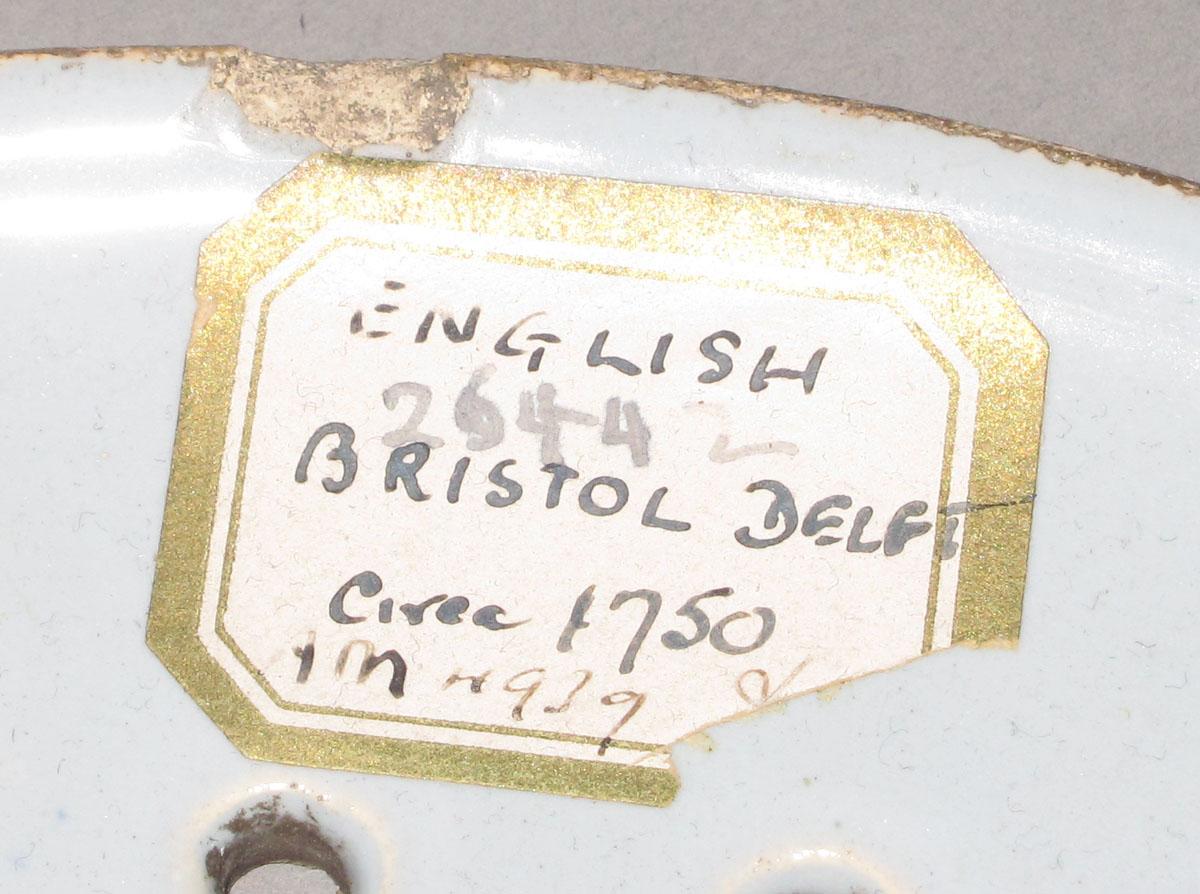 1952.0094 Porcelain drainer tray label