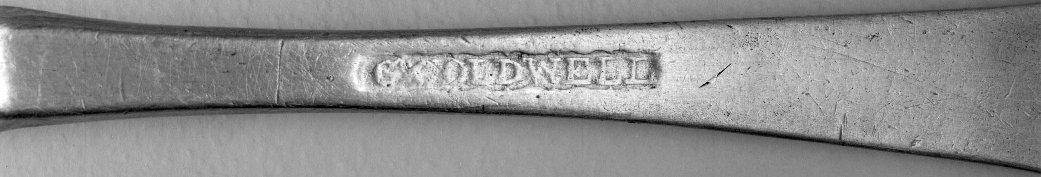 1963.0055 Pewter spoon (mark)