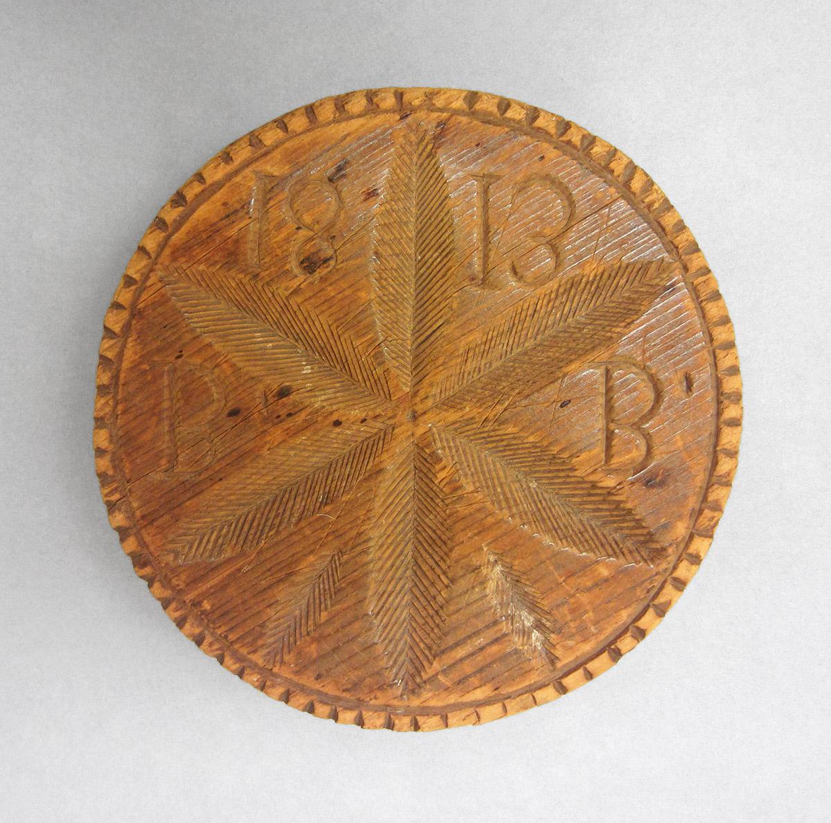1963.0063, Butter mold, side 1