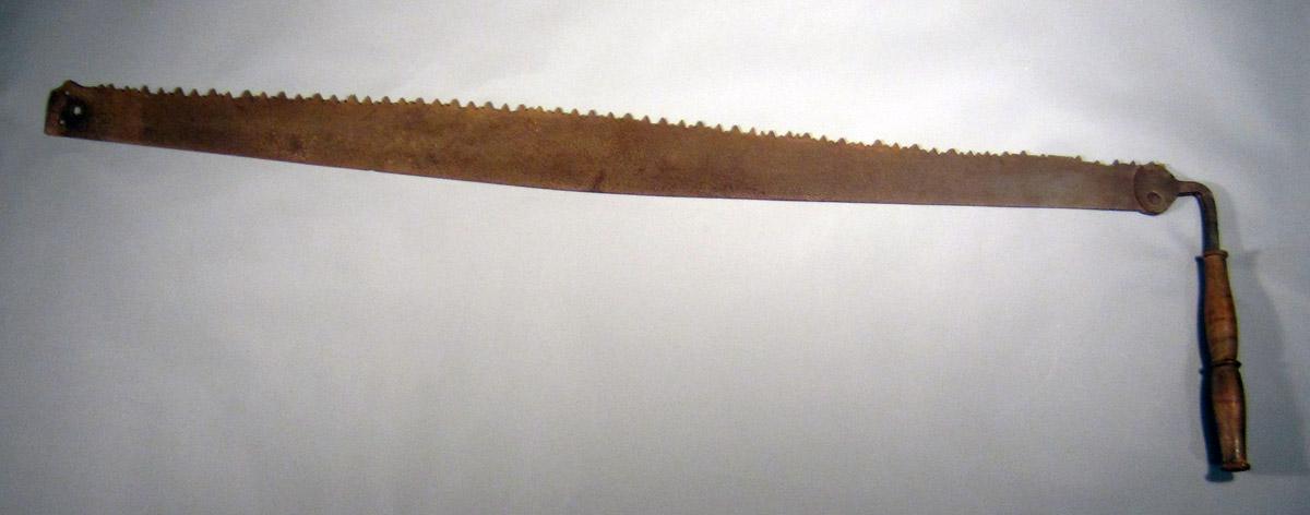 1963.0080 Cross-cut saw, Side 1