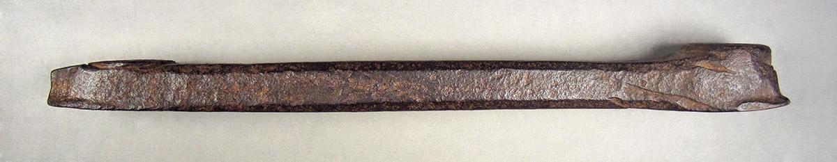 1963.0082, Bolt or rivet header, side 2