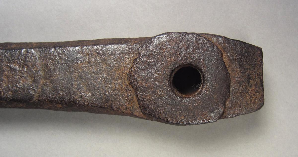 1963.0082, Bolt or rivet header, end 2 side 1