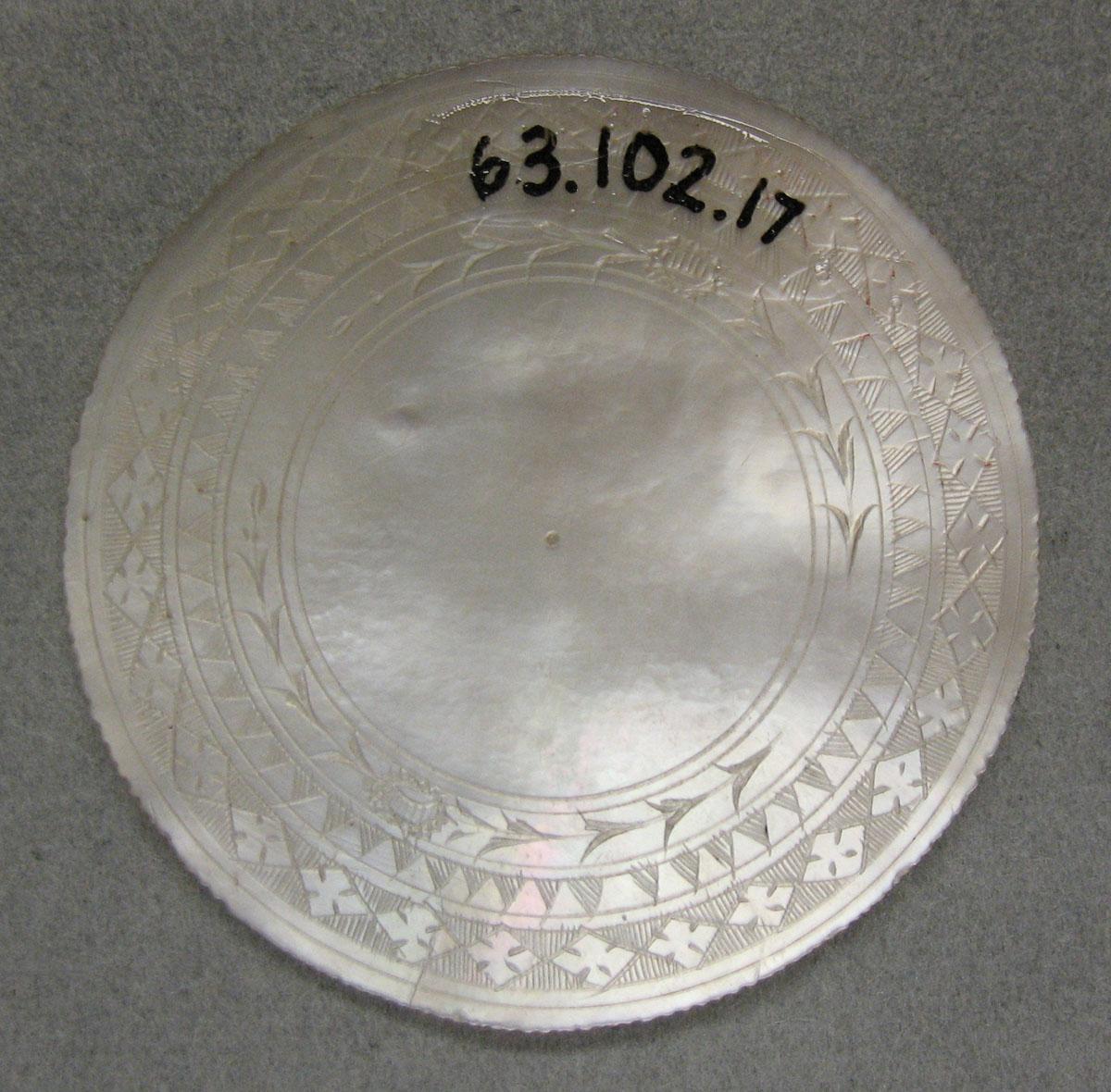1963.0102.017 Game counter, view 1