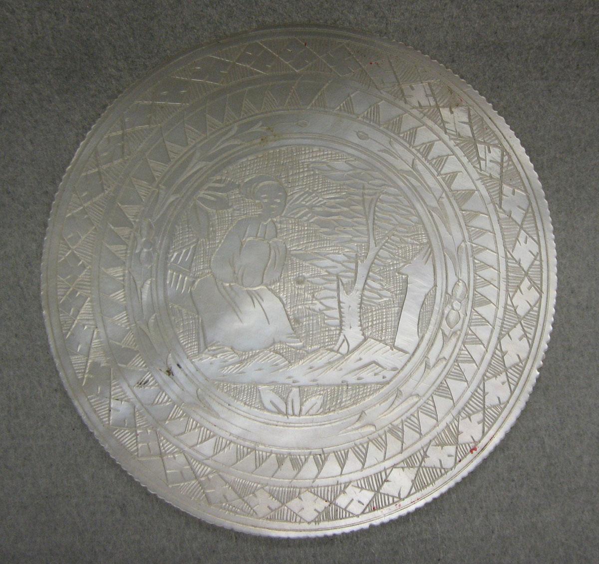 1963.0102.022 Game counter, obverse