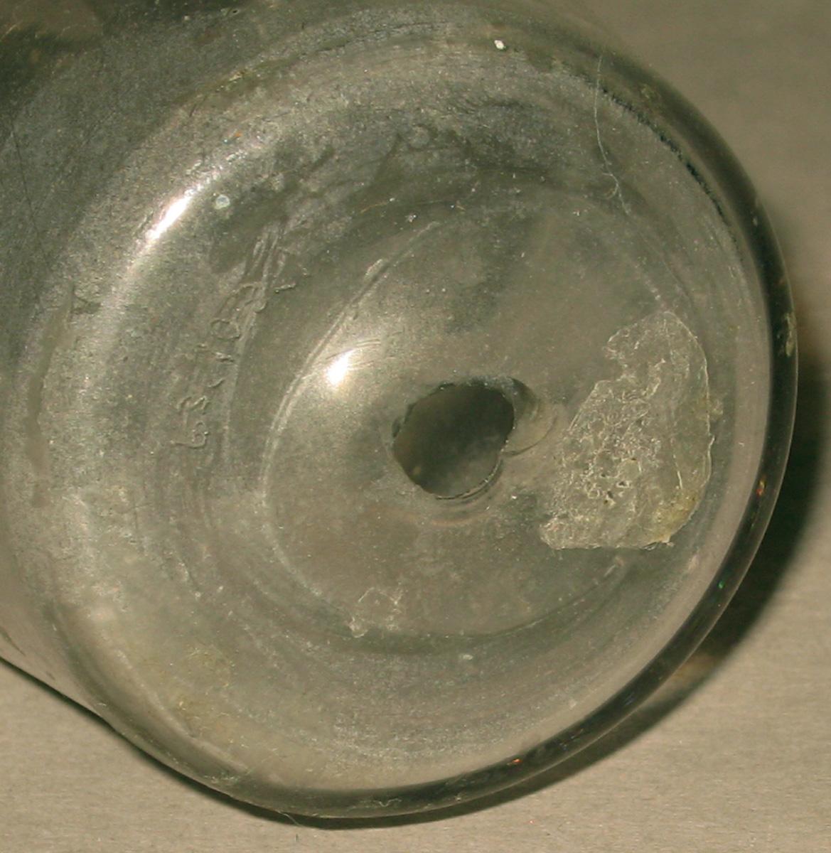 1963.0103.001 Glass punch lifter (bottom)