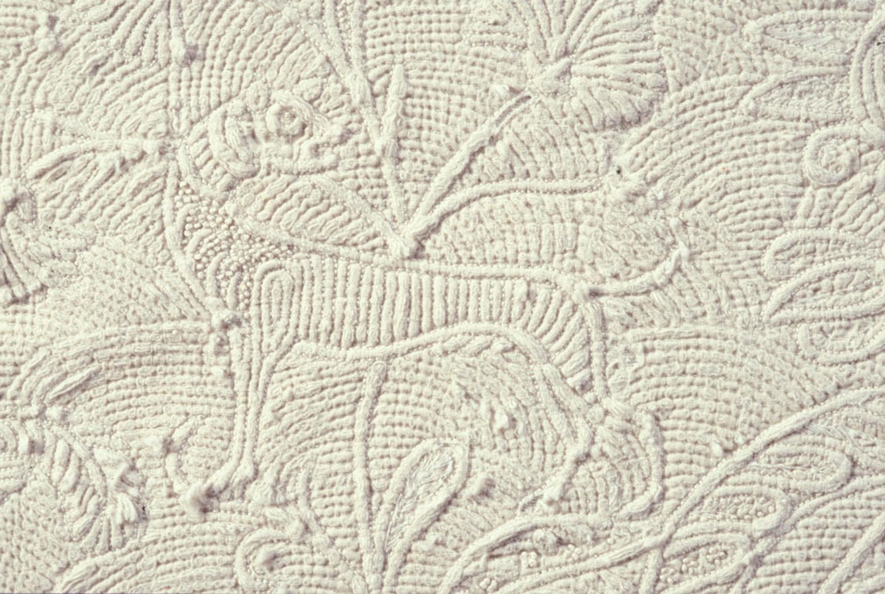 1963.0112 Textile fragment (Detail 4, dog)