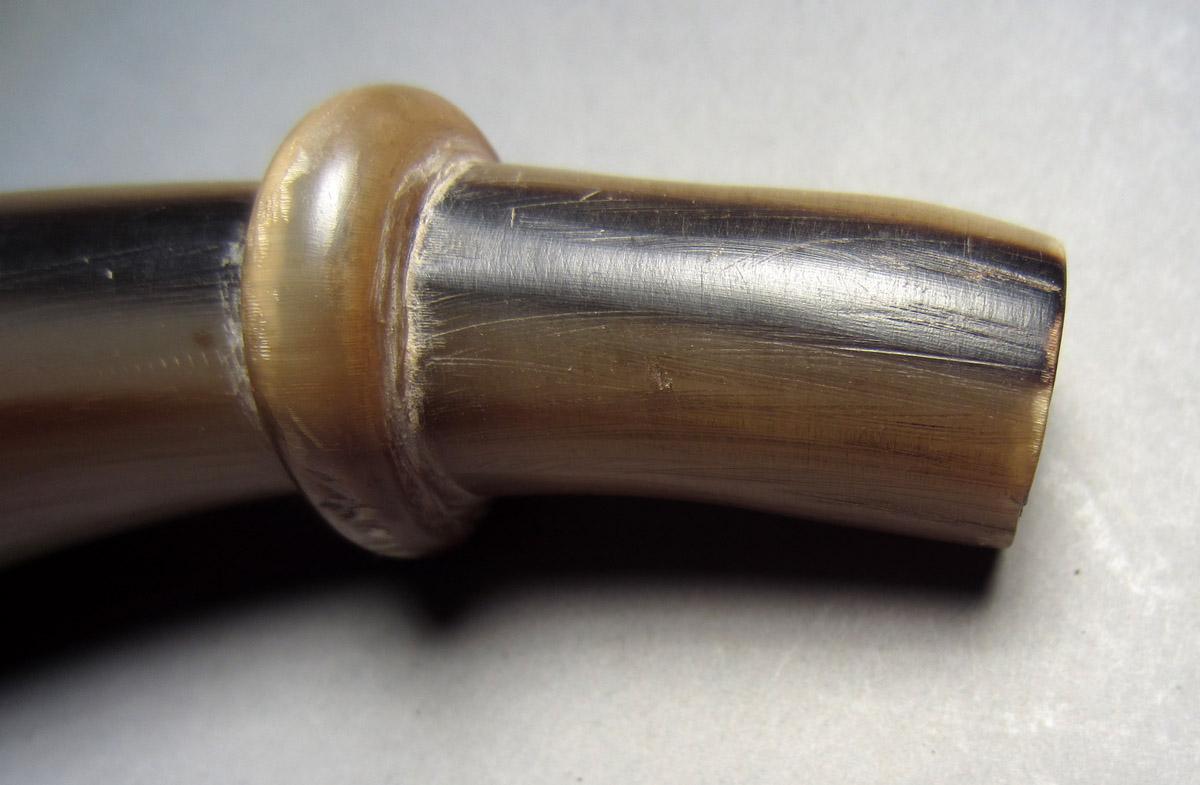 1963.0156.011 Powder horn, Tip