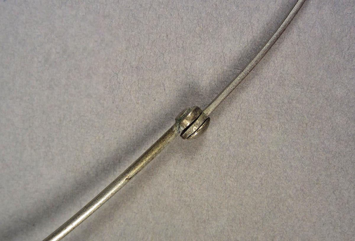 1963.0156.040 B, Eyeglasses, extension piece detail