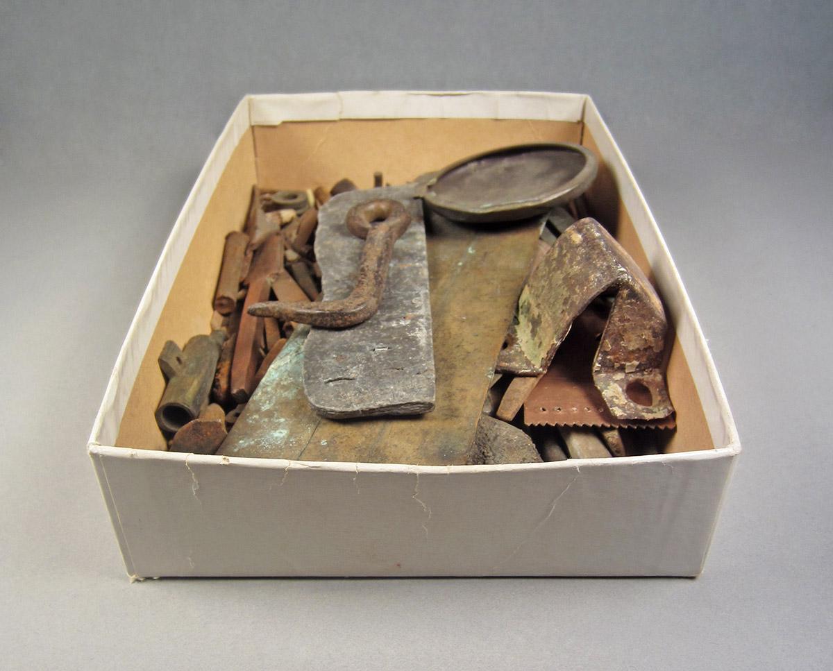 1963.0156.047, Box of scrap metal, angle 2