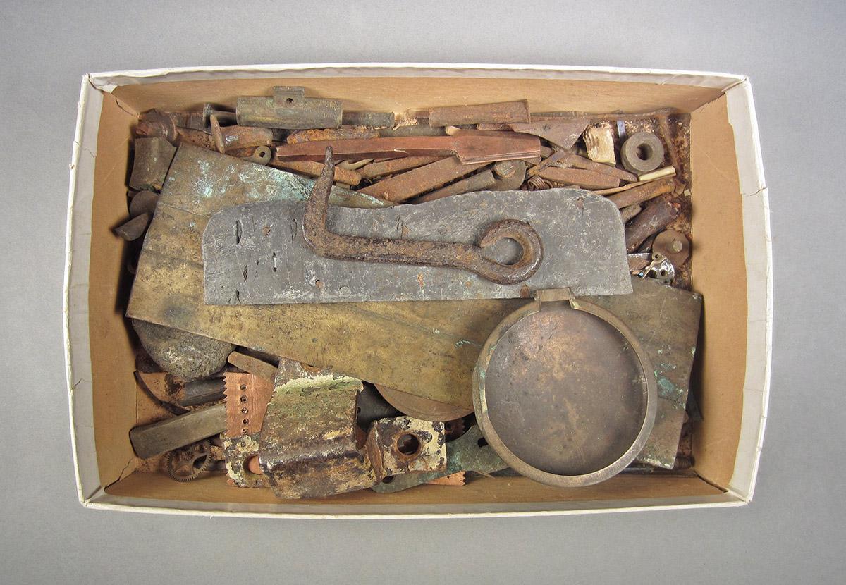 1963.0156.047, Box of scrap metal, top
