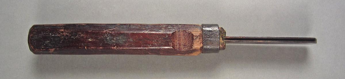 1963.0156.063, Lathe tool, side 1