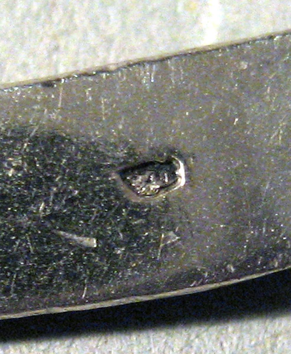 1955.0136.056 B Silver Knife mark