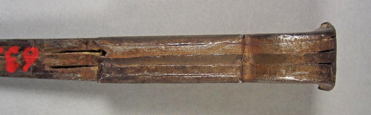 1963.0156.133, Punch, end side 1