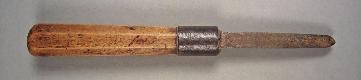 1963.0156.143, Lathe tool, side 1