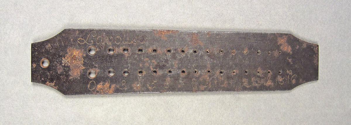 1963.0156.249, Gauge, side 1