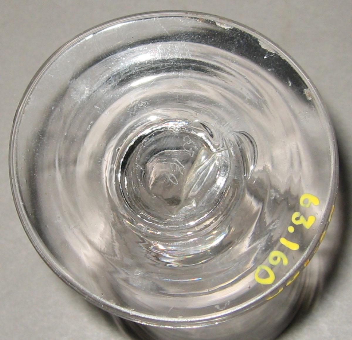 1963.0160 Glass wineglass (underside)