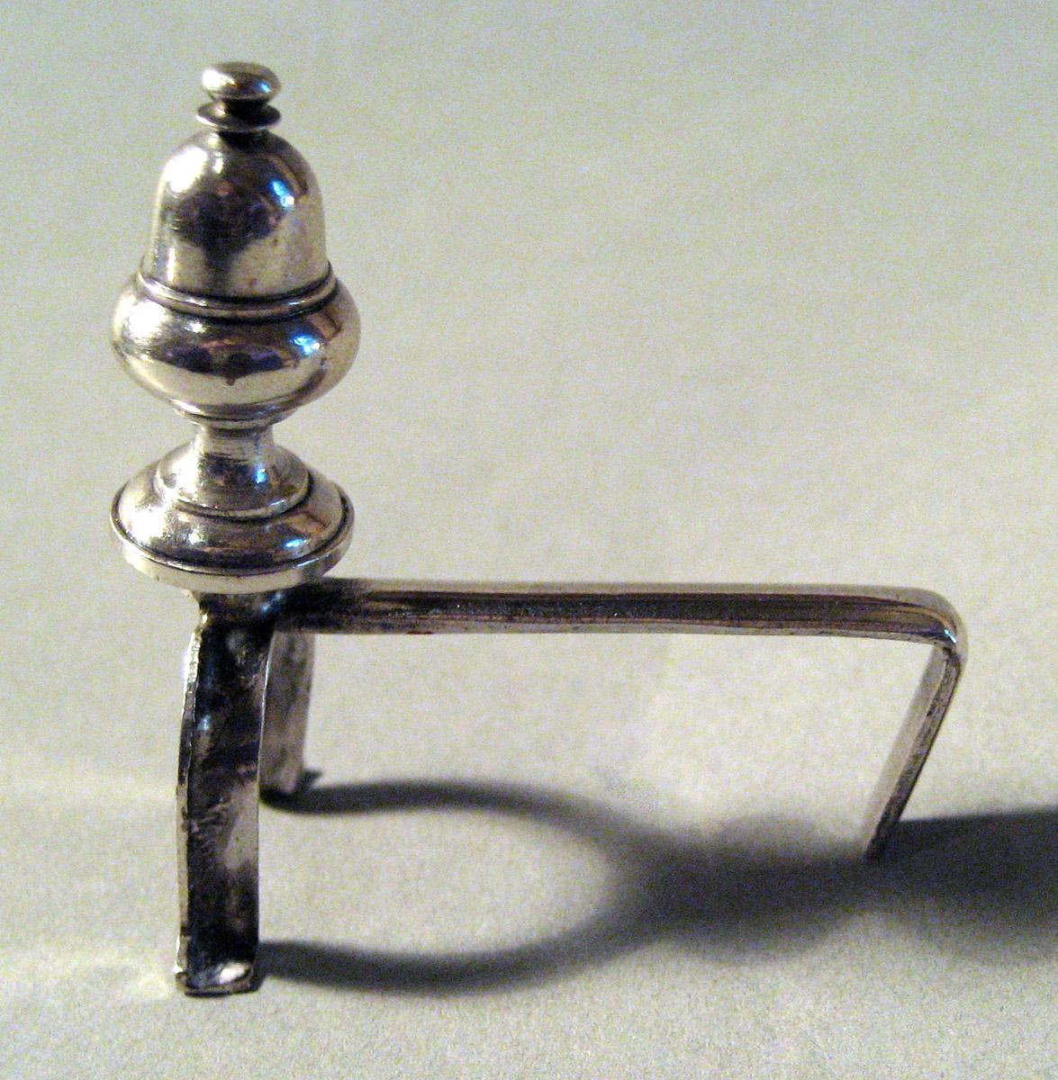 1955.0136.066 B Silver and Iron Andiron side view
