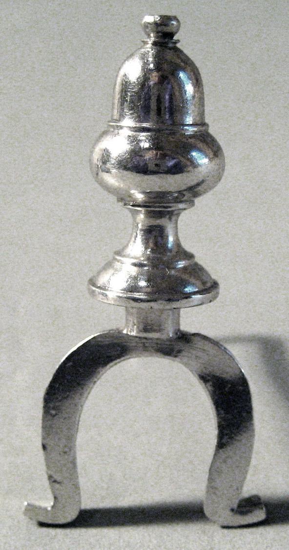 1955.0136.066 C Silver and Iron Andiron front view