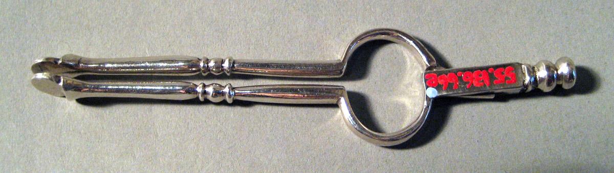 1955.0136.066 E Silver and Iron Tongs underside