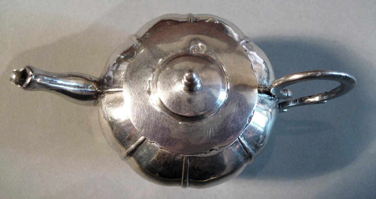 1955.0136.069 A, B Silver Teapot top view