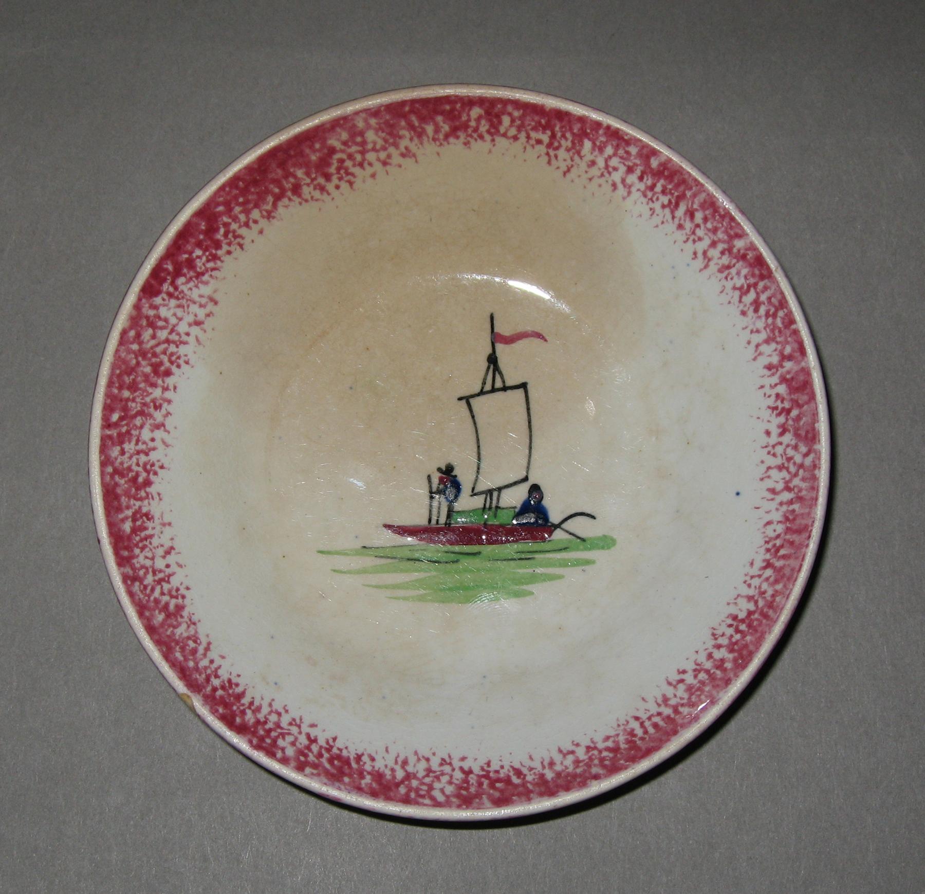1963.0586 Spatterware miniature saucer
