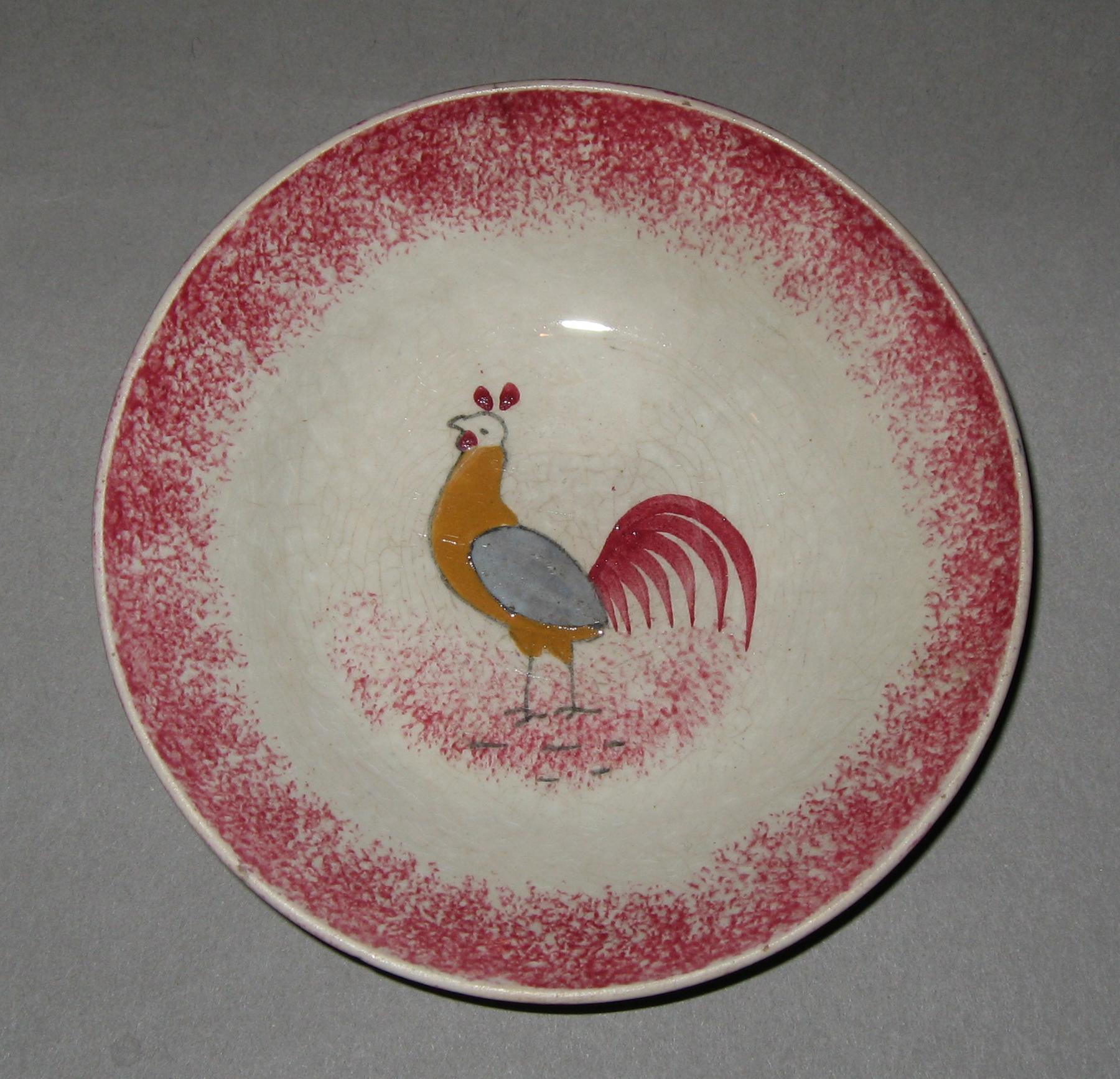 1963.0587 Spatterware miniature saucer